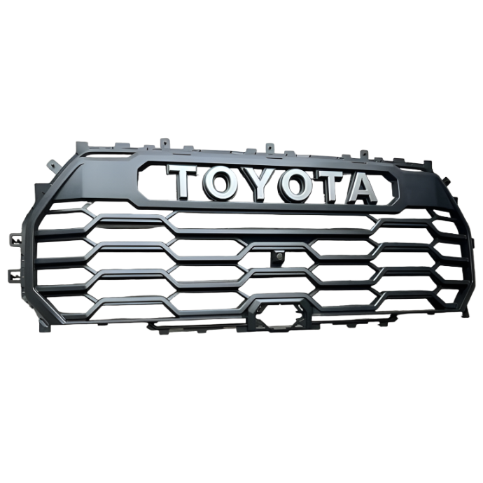 A black Toyota Tundra TRD Pro grille kit with a honeycomb design and the Toyota logo at the top.
